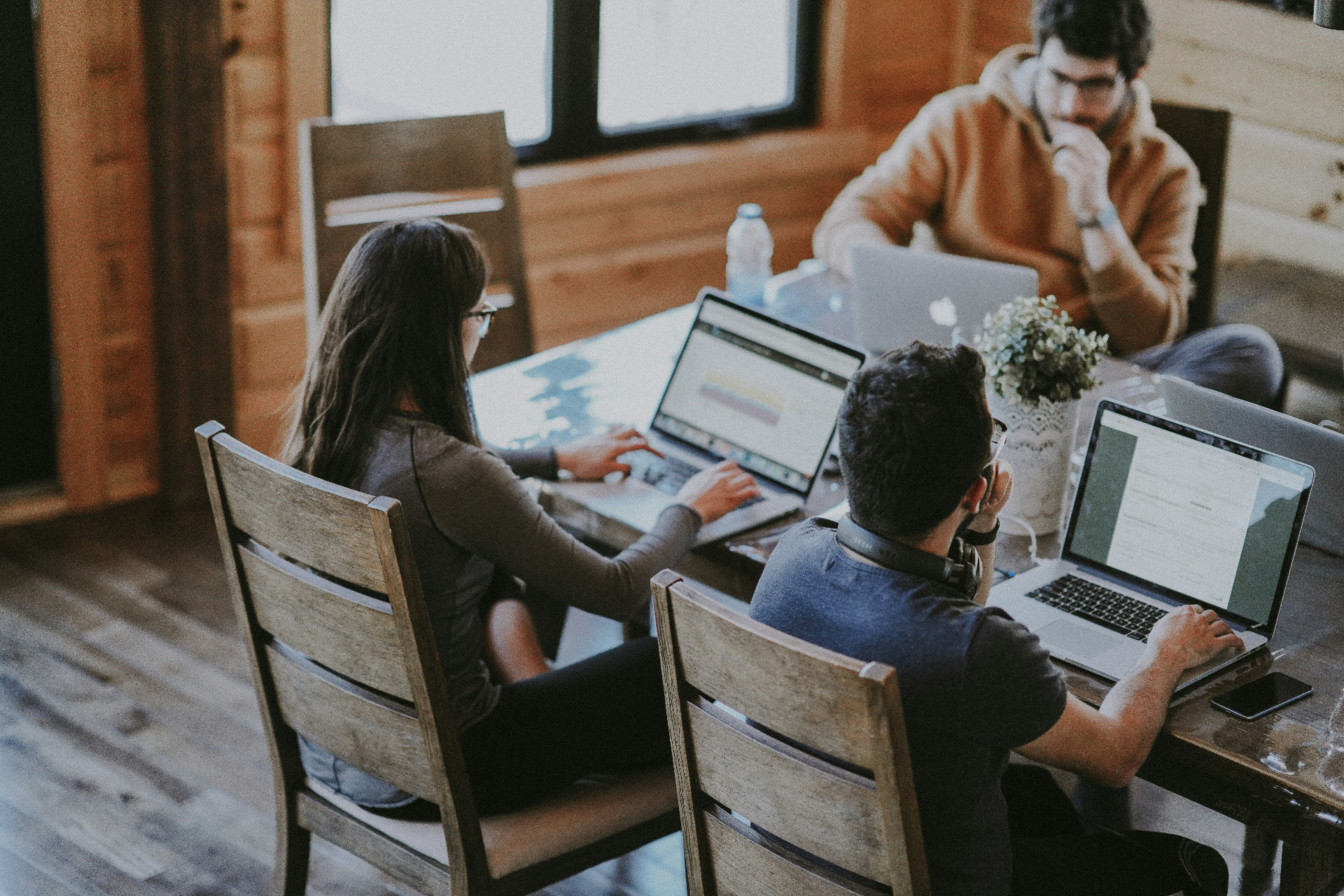 Diverse team of professionals collaborating in a modern office